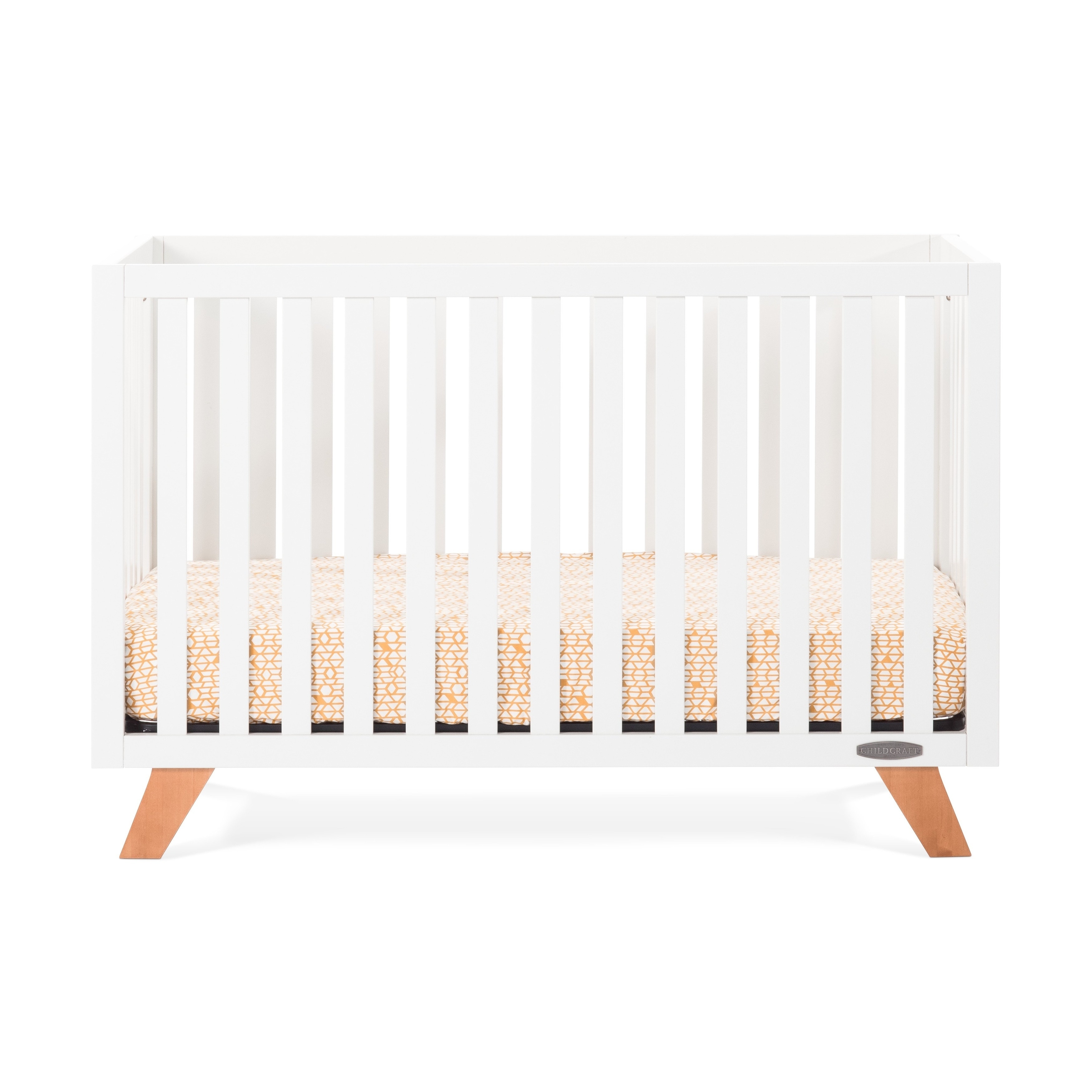 white crib with natural wood