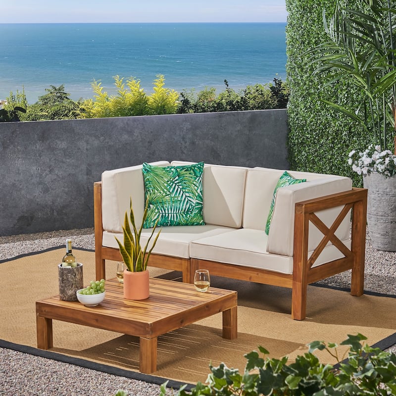 Brava Outdoor 2-Seater Sectional Acacia Wood Loveseat Set with Coffee Table and Cushions by Christopher Knight Home