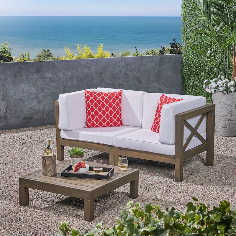 Brava Outdoor 2-Seater Sectional Acacia Wood Loveseat Set with Coffee Table and Cushions by Christopher Knight Home