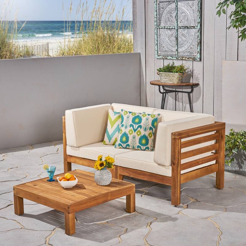 Oana Outdoor 2-Seater Acacia Wood Sectional Loveseat and Coffee Table Set with Cushions by Christopher Knight Home