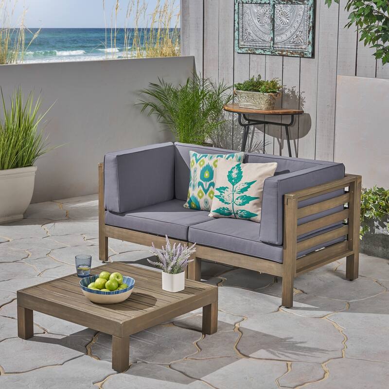 Oana Outdoor 2-Seater Acacia Wood Sectional Loveseat and Coffee Table Set with Cushions by Christopher Knight Home