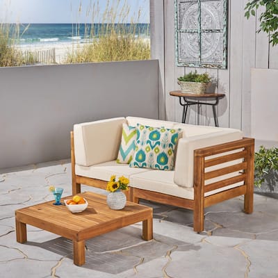 Oana Outdoor 2-Seater Acacia Wood Sectional Loveseat and Coffee Table Set with Cushions by Christopher Knight Home
