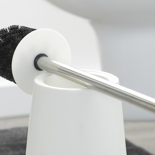 white porcelain toilet brush holder