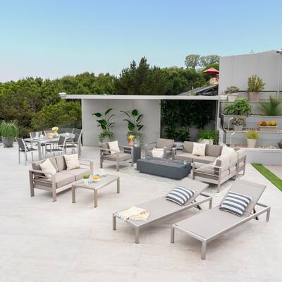 Cape Coral 7 Piece Dining Set and Sofa Set and 4pc Chat Set and Fire Pit and 2 Chaise Lounges by Christopher Knight Home