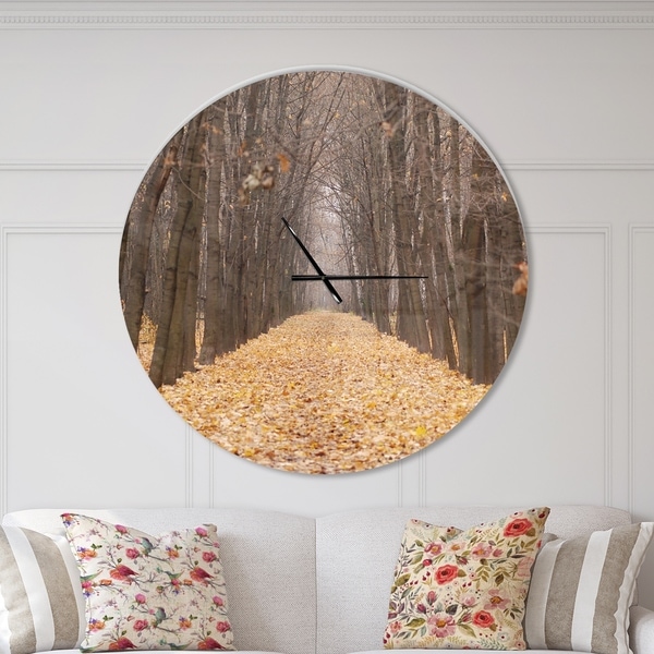 Designart 'Yellow Road through Fall Forest' Oversized Traditional Wall CLock