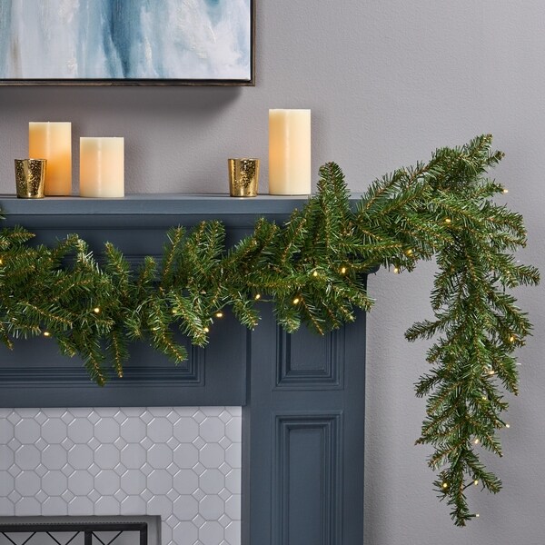 9-foot Fraser Fir Pre-Lit Warm White LED Artificial Christmas Garland by Christopher Knight Home - led - clear. Opens flyout.