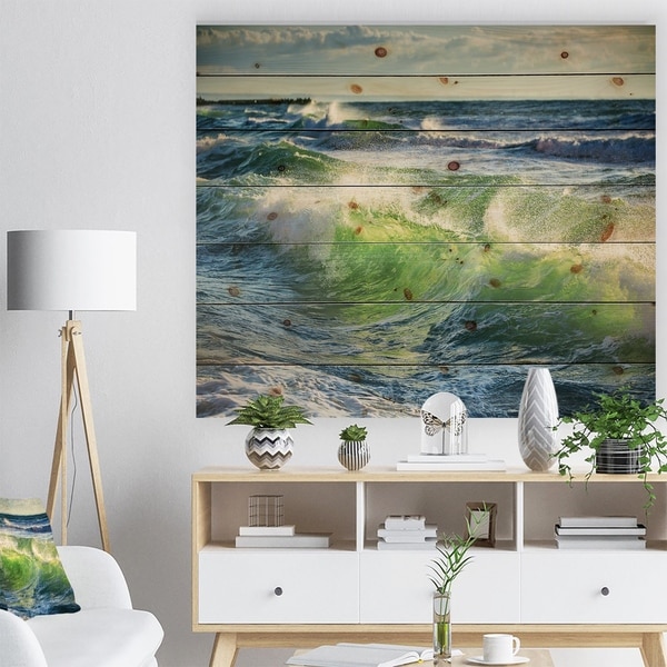 Designart 'Sunrise and Shining Waves in Ocean' Beach Photo Print on Natural Pine Wood - Blue
