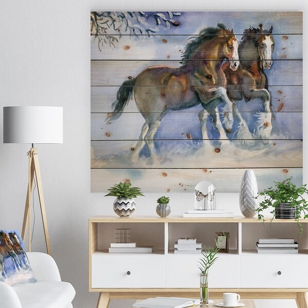 Designart 'Horses running in winter' Farmhouse Animals Print on Natural Pine Wood - Blue