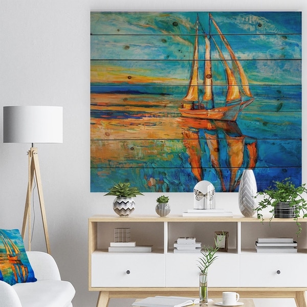 Designart 'Sail Ship at Sunset in Blue Sky' Sea & Shore Painting Print on Natural Pine Wood