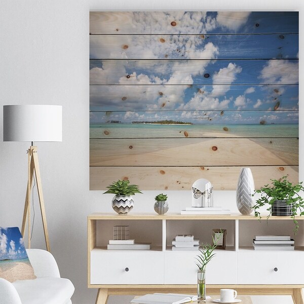 Designart 'Serene Maldives Beach under Clouds' Seascape Print on Natural Pine Wood - Blue