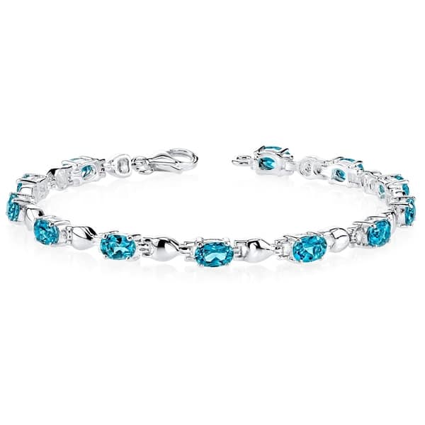 handmade one of a kind Swiss Blue Topaz and silver tennis bracelet