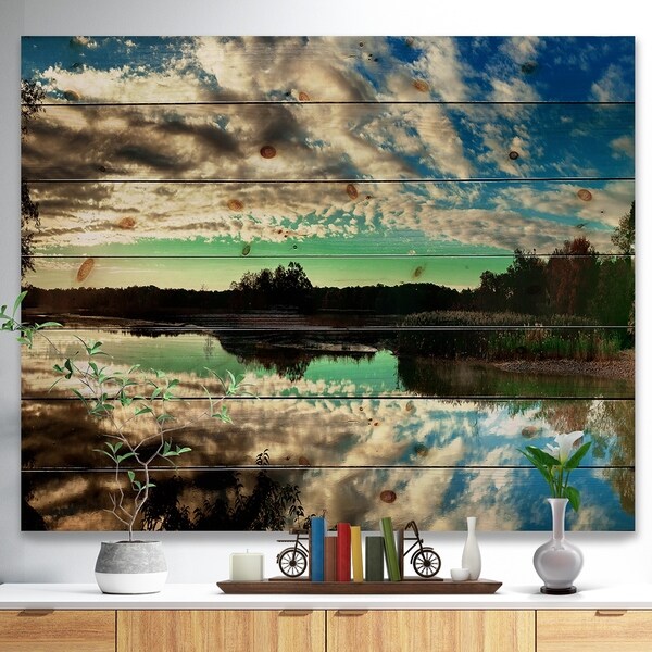 Designart 'Sky Clouds Mirrored in River Panorama' Landscape Print on Natural Pine Wood - Blue