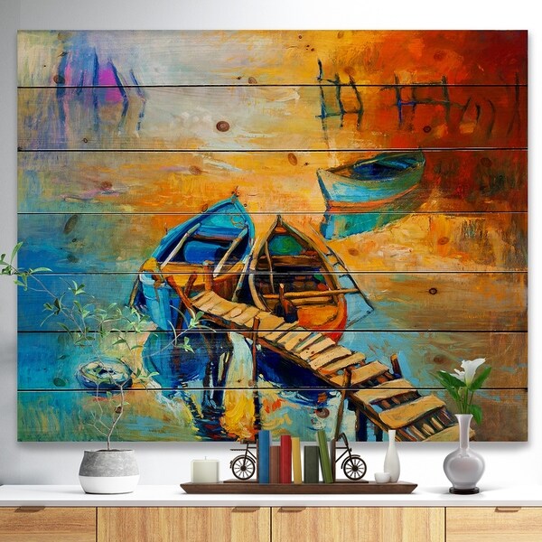 Designart 'Two Boats in Pier at Golden Sunset' Sea & Shore Painting Print on Natural Pine Wood - Blue