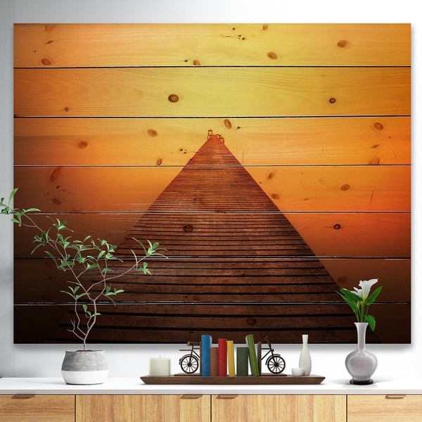 Designart 'Old Wooden Bridge into Infinity Sea' Pier Seascape Print on Natural Pine Wood - Orange