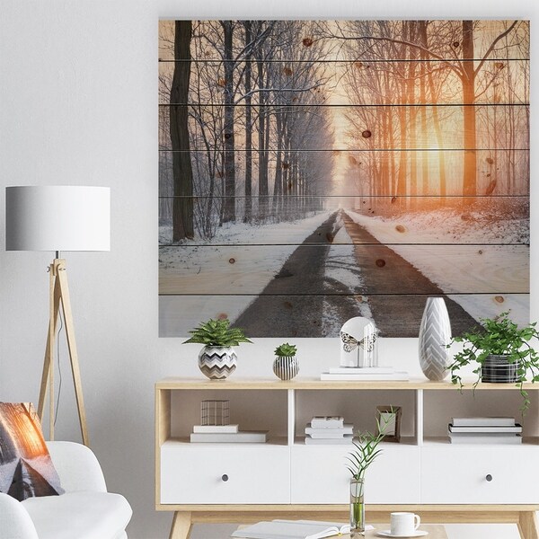 Designart 'Bright Sun Break in Winter Forest' Forest Print on Natural Pine Wood - White