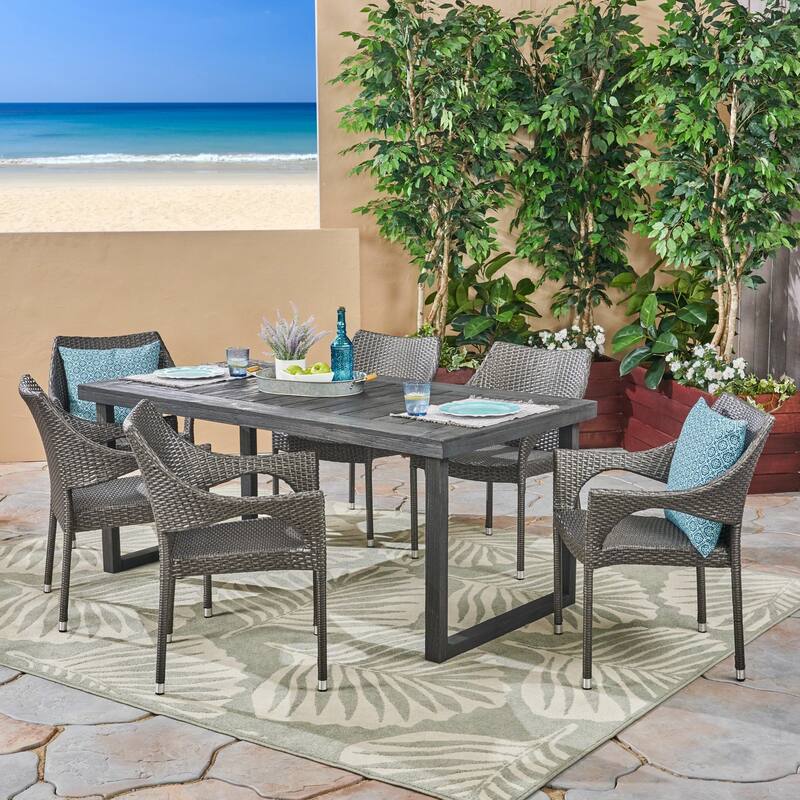 Lecanto Outdoor 7 Piece Acacia Wood Dining Set with Stacking Wicker Chairs by Christopher Knight Home