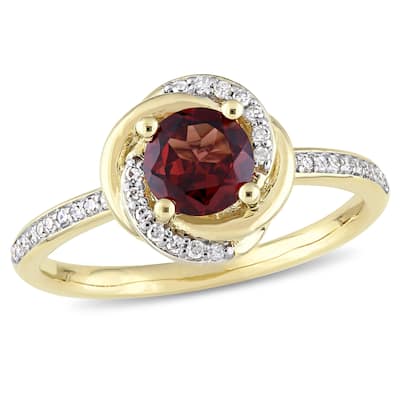 Miadora 10k Yellow Gold Garnet and 1/6ct TDW Diamond Swirl Halo Ring