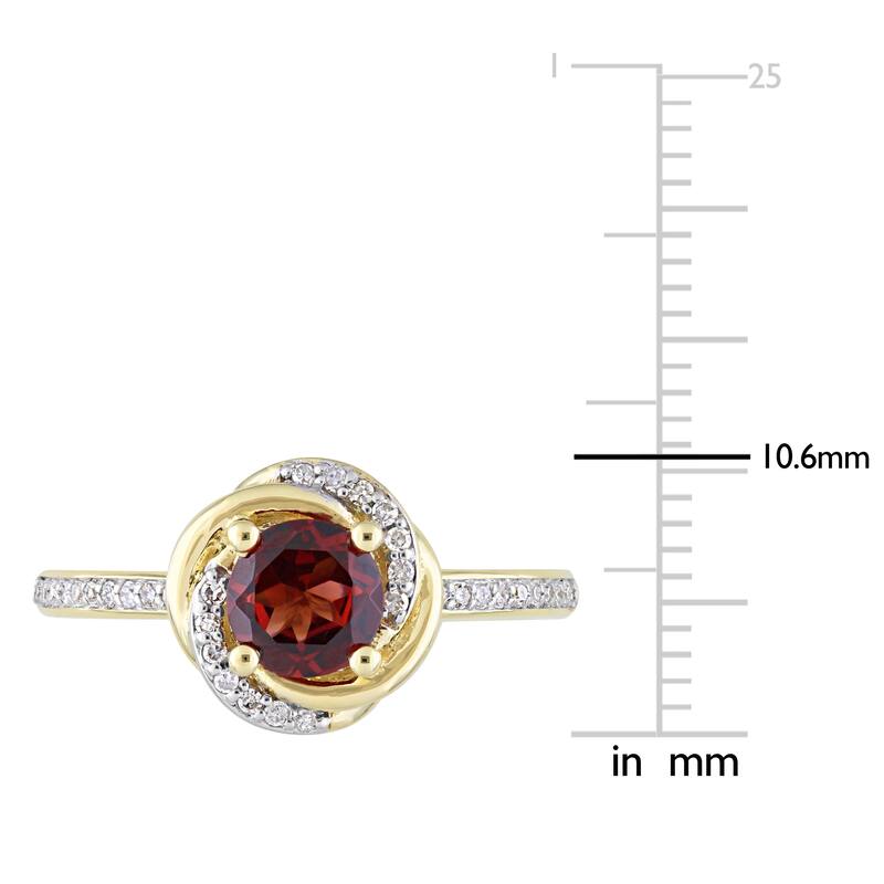 Miadora 10k Yellow Gold Garnet and 1/6ct TDW Diamond Swirl Halo Ring