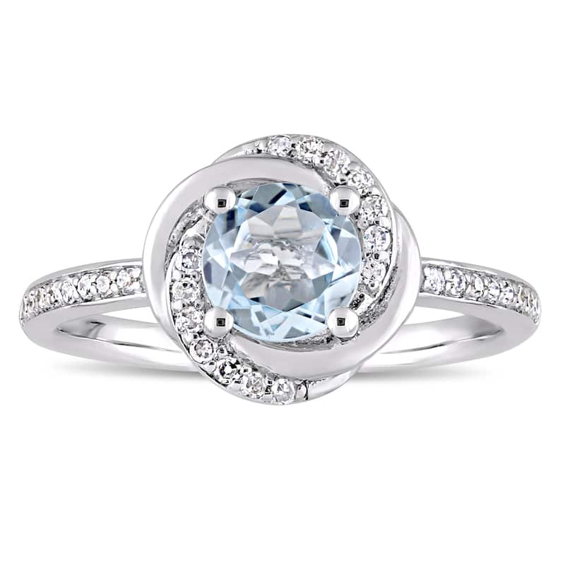 Miadora 10k White Gold Sky-Blue Topaz and 1/6ct TDW Diamond Swirl Halo Ring
