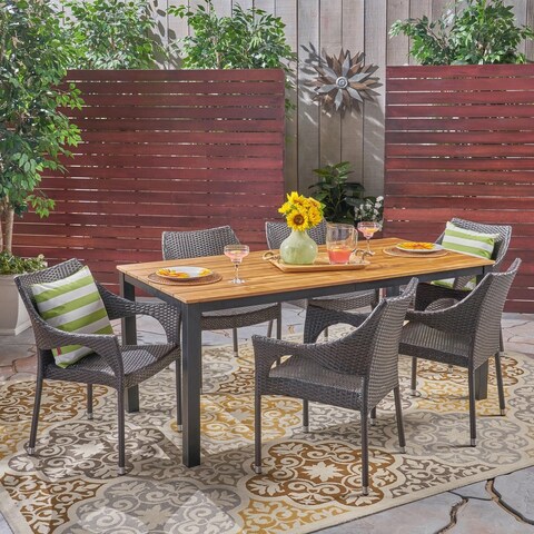 Tudor Outdoor 7 Piece Acacia Wood Dining Set with Stacking Wicker Chairs by Christopher Knight Home