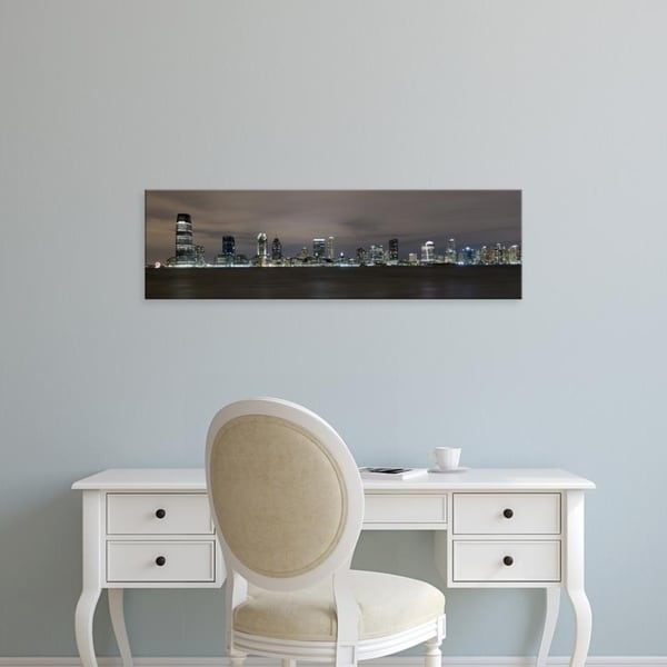 Easy Art Prints Panoramic Images's 'Buildings in city lit up, Hudson River, Jersey City, Hudson New Jersey' Premium Canvas Art