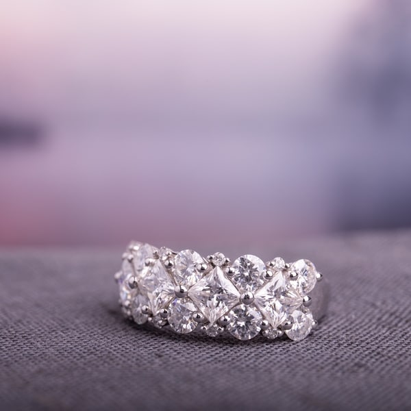 Miadora 3 1/10ct DEW Princess-cut Moissanite & 1/10ct TDW Diamond Anniversary Band in 10k White Gold. Opens flyout.