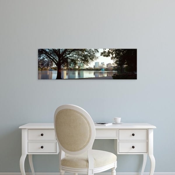 Easy Art Prints Panoramic Images's 'Buildings at the waterfront, Lake Eola, Orlando, Orange County, Florida' Premium Canvas Art