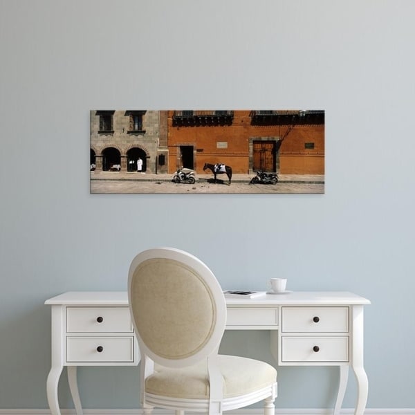 Easy Art Prints Panoramic Images's 'Horse standing, Motorcycles parked, San Miguel De Allende, Guanajuato, Mexico' Canvas Art