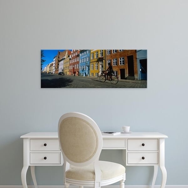 Easy Art Prints Panoramic Images's 'Woman Riding A Bicycle, Copenhagen, Denmark' Premium Canvas Art