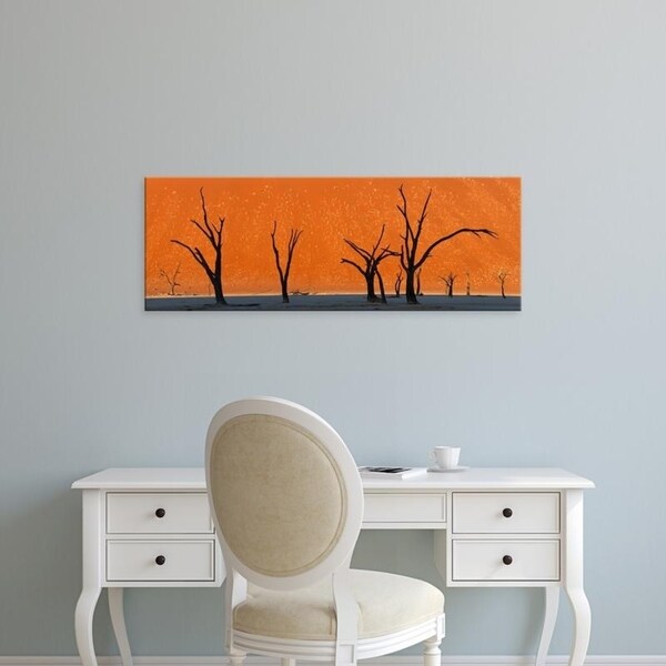 Easy Art Prints Panoramic Images's 'Dead trees by red sand dunes, Dead Vlei, Namib-Naukluft National Park, Namibia' Canvas Art