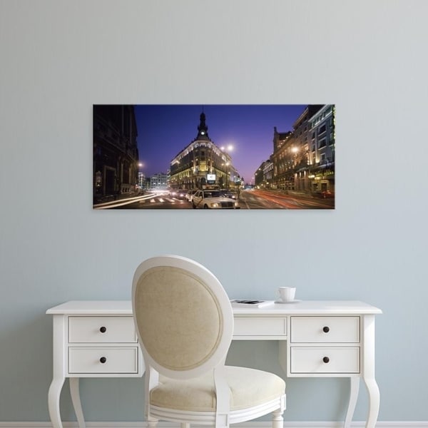 Easy Art Prints Panoramic Images's 'Streets lit up at dusk, Gran Via, Madrid, Spain' Premium Canvas Art