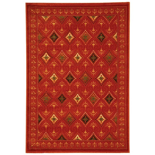 Fine spun Regal Orange/ Multi Area Rug (53 X 77) (RedPattern GeometricMeasures 0.375 inch thickTip We recommend the use of a non skid pad to keep the rug in place on smooth surfaces.All rug sizes are approximate. Due to the difference of monitor colors,