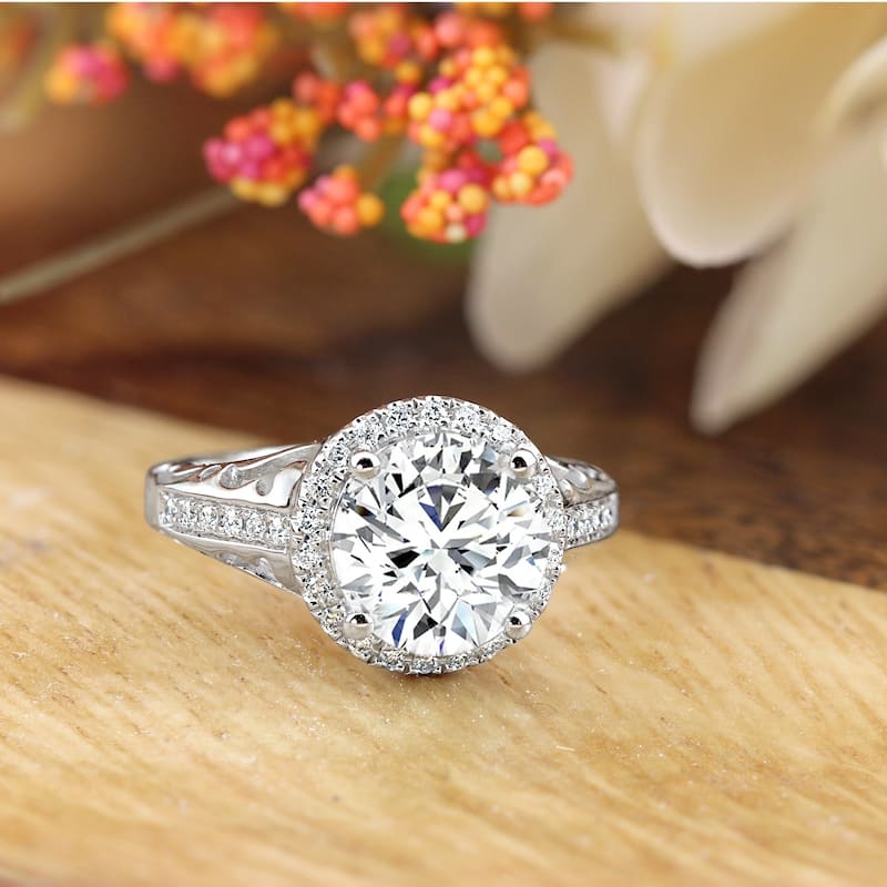 Round 1 1/3ct Moissanite and 1/5ct TDW Diamond Halo Engagement Ring