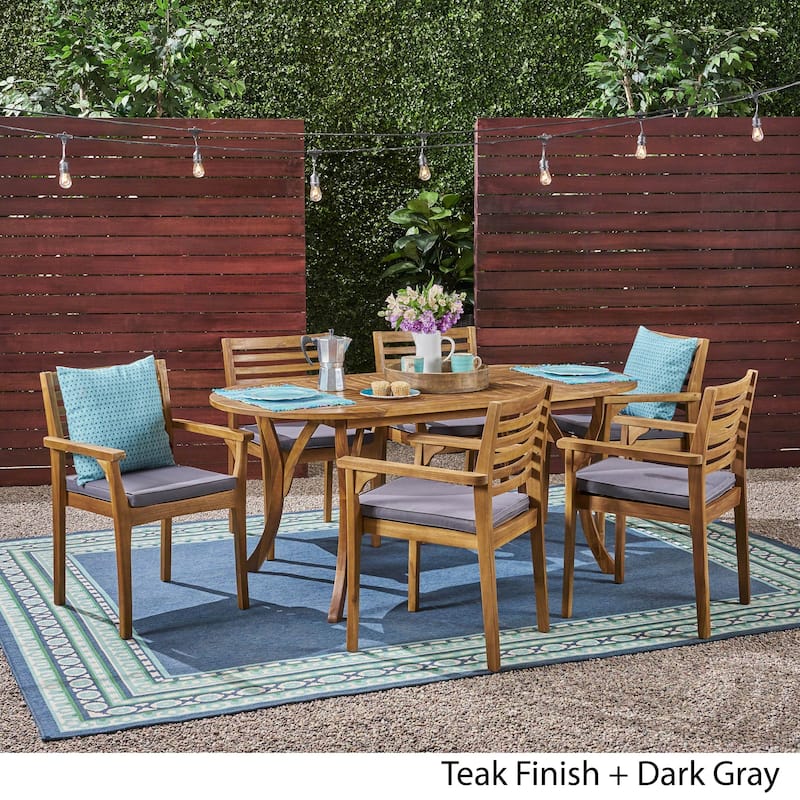 Casa Outdoor 6-Seater 70" Oval Acacia Dining Set with Carved Legs by Christopher Knight Home