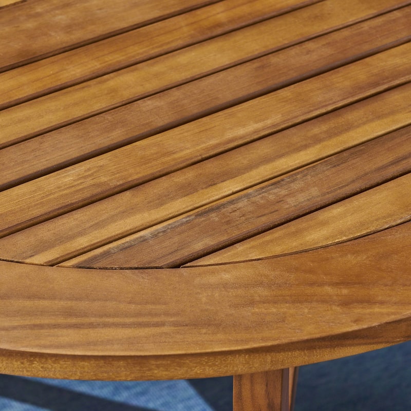 Casa Outdoor 6-Seater 70" Oval Acacia Dining Set with Carved Legs by Christopher Knight Home