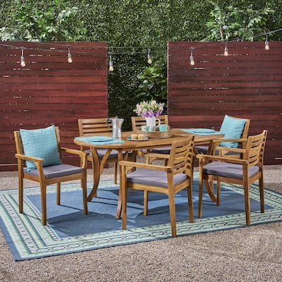 Casa Outdoor 6-Seater 70" Oval Acacia Dining Set with Carved Legs by Christopher Knight Home