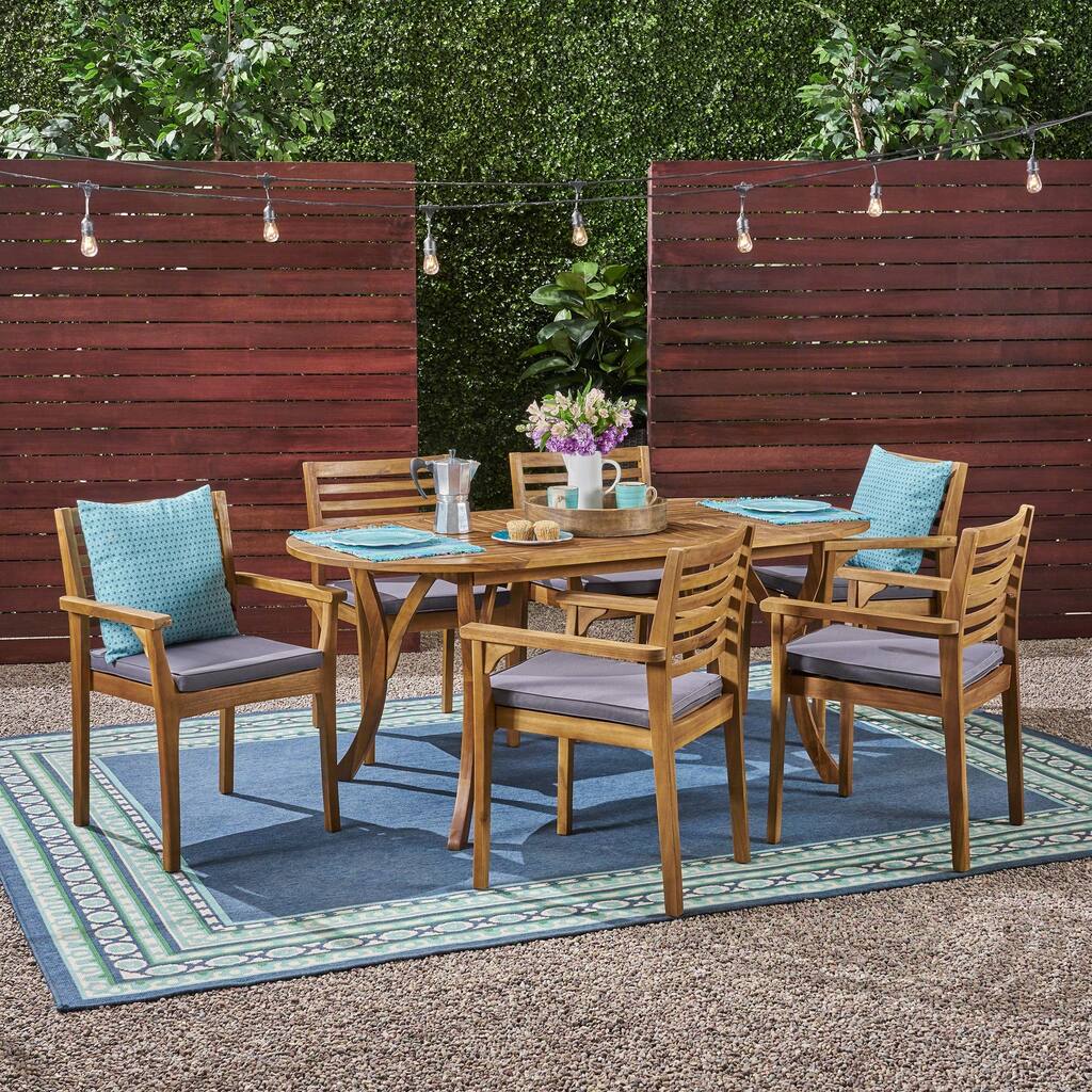 Casa Outdoor 6-Seater 70" Oval Acacia Dining Set with Carved Legs by Christopher Knight Home