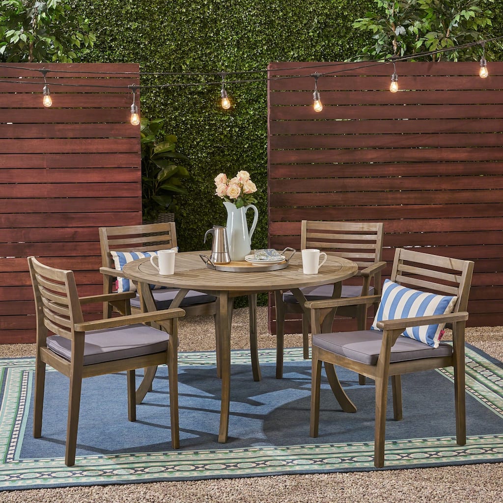 Casa Outdoor 4-Seater 47" Round Acacia Dining Set with Carved Legs by Christopher Knight Home