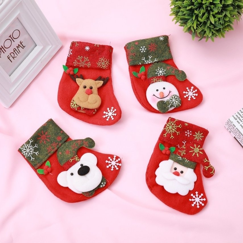 https://ak1.ostkcdn.com/images/products/25737457/Christmas-Sock-Candy-Bag-Cartoon-Decor-Non-woven-Fabric-Christmas-Gift-Pouch-b3c174c5-a4fb-4357-8934-f86212dccc1c.jpg