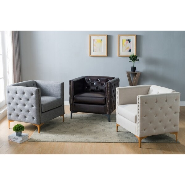 cream tufted accent chair with nailhead trim