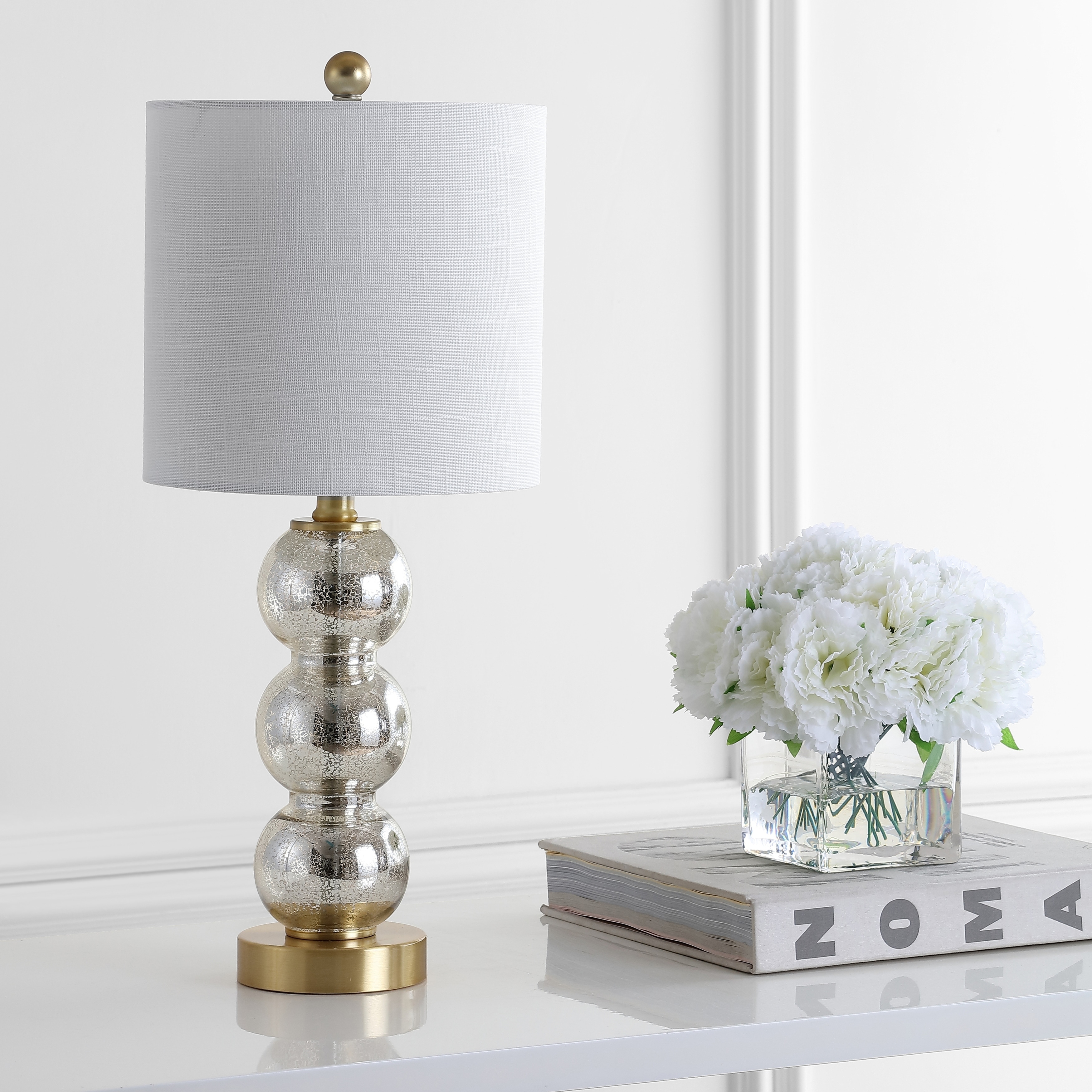 glass and gold table lamp