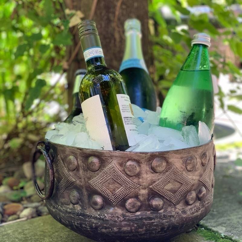 The Curated Nomad Haitia Handmade Hammered Metal Bowl with Handles