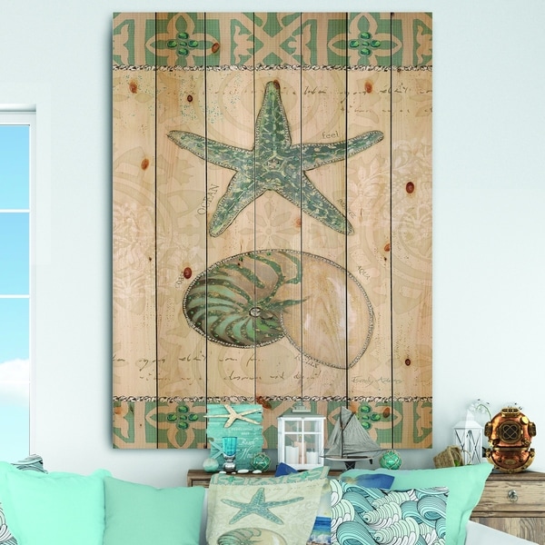 Designart 'Seastar and Blue Sea Shell I' Nautical & Coastal Print on Natural Pine Wood