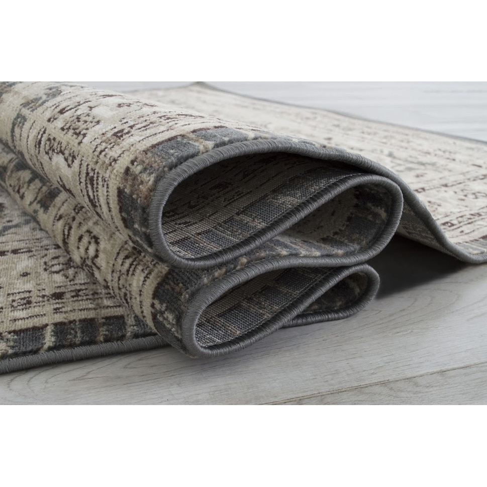 https://ak1.ostkcdn.com/images/products/26062405/Allstar-Rugs-Distressed-Grey-Rectangular-Accent-Area-Rug-with-Ivory-Persian-Design-7-6-x-9-8-96da9d08-3826-4b07-9b75-540d46bc3e61.jpg