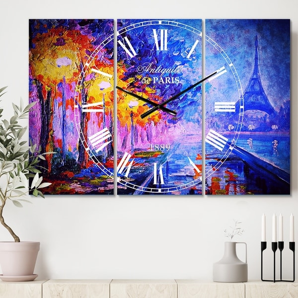 Designart 'View of Paris Eiffel Tower' Cottage 3 Panels Oversized Wall CLock - 36 in. wide x 28 in. high - 3 panels