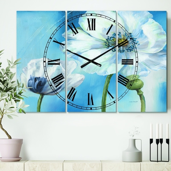 Designart 'White Flower on Blue I' Cottage 3 Panels Large Wall CLock - 36 in. wide x 28 in. high - 3 panels