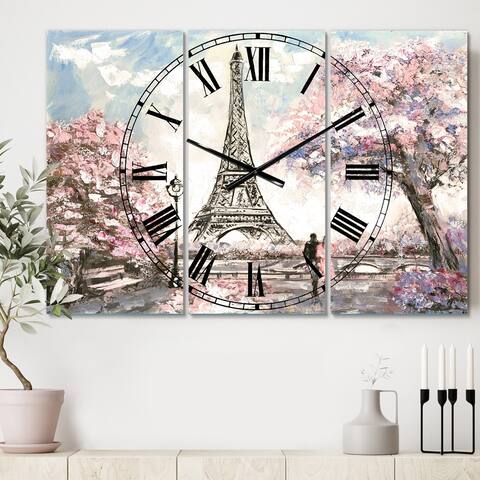 Designart 'Eiffel with Pink Flowers' Cottage 3 Panels Oversized Wall CLock - 36 in. wide x 28 in. high - 3 panels