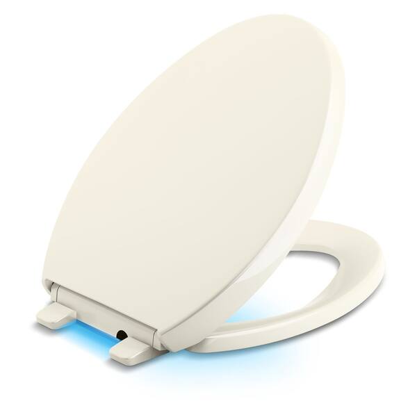 Kohler Reveal® Nightlight QuietClose™ Elongated Toilet Seat Biscuit (K7579296) Bed Bath