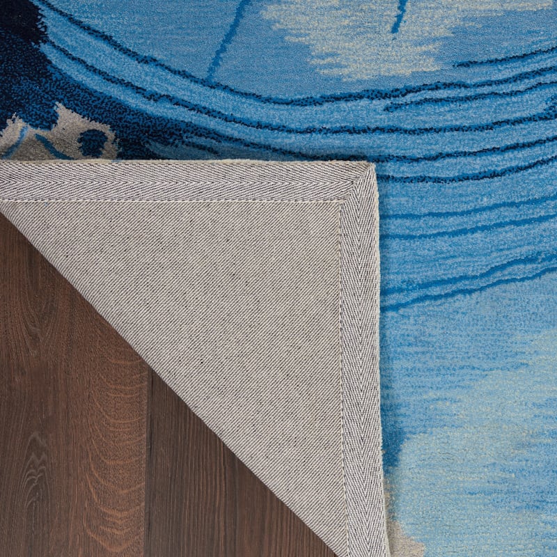 Nourison Symmetry Blue/Ivory Abstract Area Rug