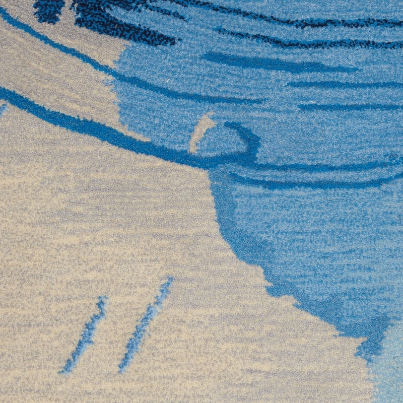 Nourison Symmetry Blue/Ivory Abstract Area Rug